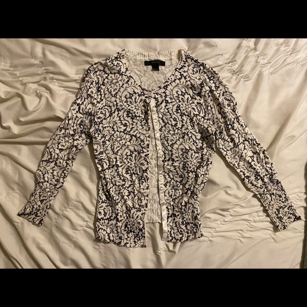Fitted black and white patterned small cardigan